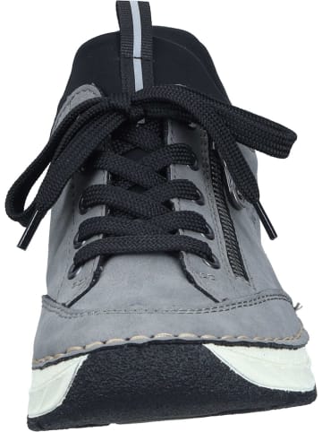 rieker Slipper in stein/schwarz