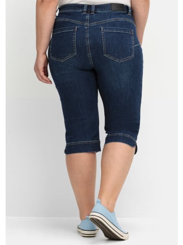 sheego Caprijeans in dark blue denim