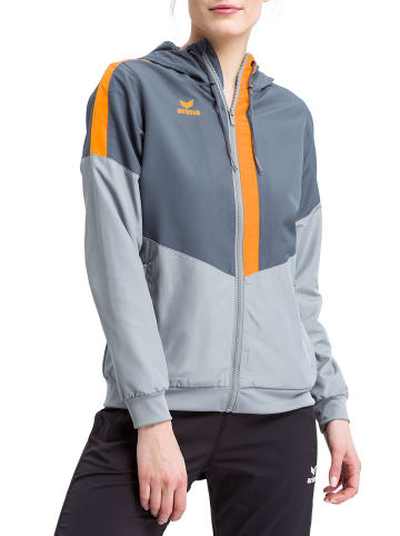erima Damen Squad Tracktop Jacke mit Kapuze in slate grey/monument grey/new orange