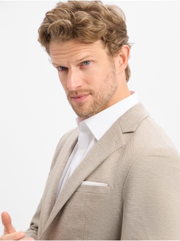 Cinque Sakko Cidati in sand