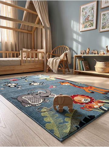 KADIMA DESIGN CASOLA Teppich Kinder Blau 80x150 Dschungel Polypropylen Kinderzimmer in Blau