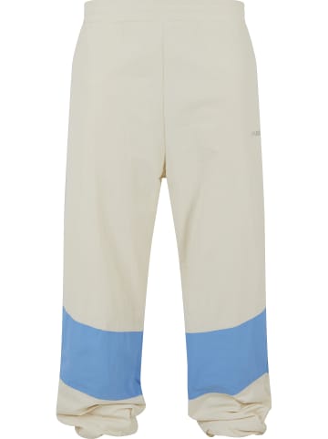 FUBU Track Pants in creme/light blue