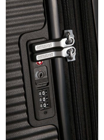 American Tourister Soundbox - 4-Rollen-Trolley 67 cm erw. (gelb) in bass black