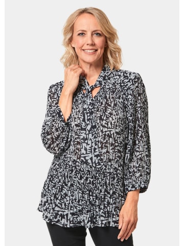 GOLDNER Kurzgröße:  Bluse Feinplissee-Bluse mit Schluppe in schwarz / weiß / gemustert