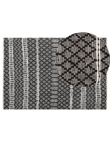 Beliani Geflochtener Teppich FEHIMLI in Schwarz/Beige - (W) 140 x (H) 1.2 x (L) 200 cm