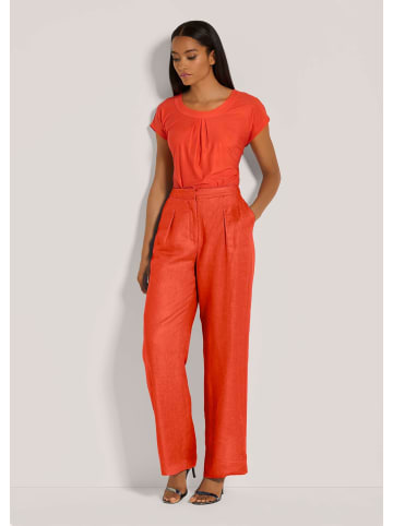 MADELEINE Weite Leinenhose mit Bundfalten in blutorange