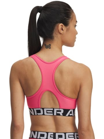 Under Armour Sport-BH "Heatgear Mid Branded" in Pink
