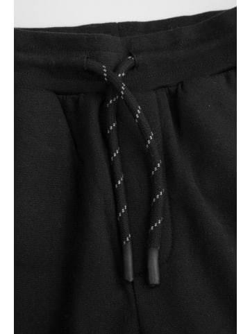 MOKIDA Jogginghose in schwarz