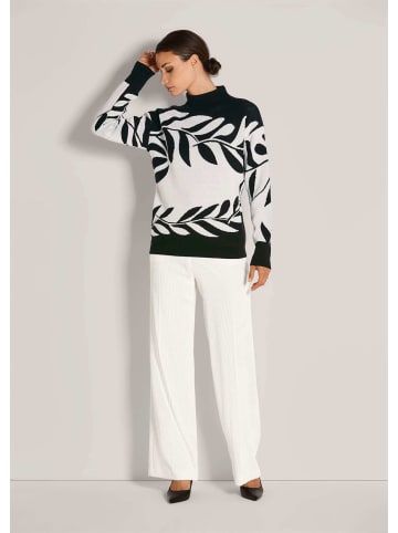 MADELEINE Moderner Winterpullover mit floralem Strickmuster in schwarz / wollweiß