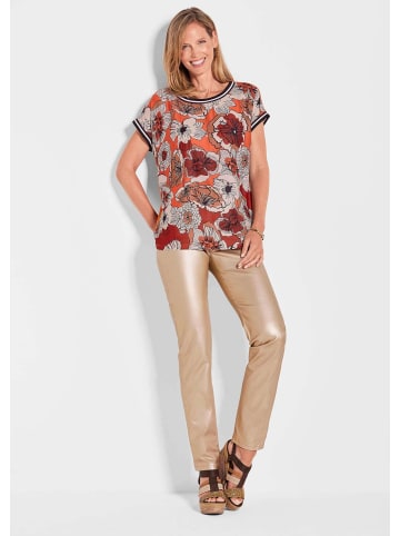 GOLDNER Kurzgröße:  Kurzarm Oberteil mit floralem Design in pfirsich / gemustert