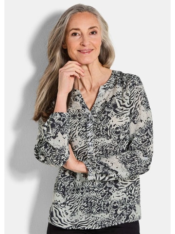 GOLDNER Kurzgröße:  Florale Druckbluse mit V-Ausschnitt in schwarz / gemustert