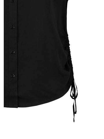 Sublevel Kurzarmbluse mit Kragen, Knopfleiste und Seitenschnürung in Schwarz