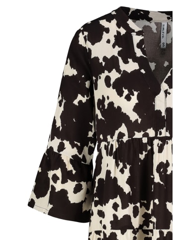 Sublevel Gemusterte Tunikabluse mit Rüschenärmeln und Volants in Braun-3