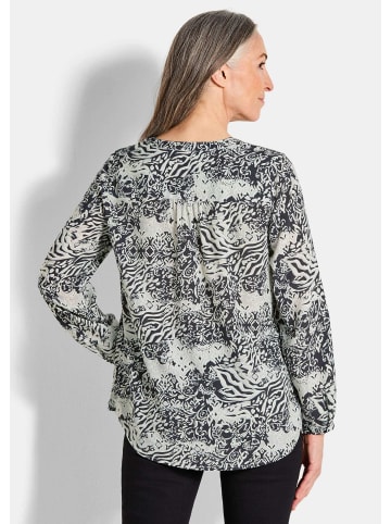 GOLDNER Kurzgröße:  Florale Druckbluse mit V-Ausschnitt in schwarz / gemustert