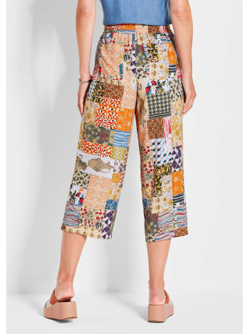 GOLDNER Kurzgröße: Stoffhose mit Patchwork-Muster in gelb / gemustert