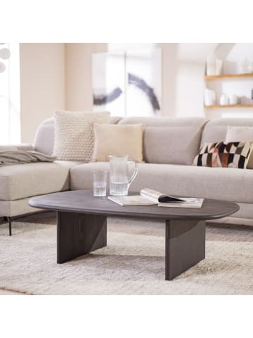 home24 Massiver Couchtisch Tajua in Schwarz