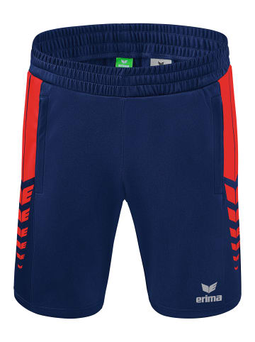 erima Six Wings Shorts in new navy/rot