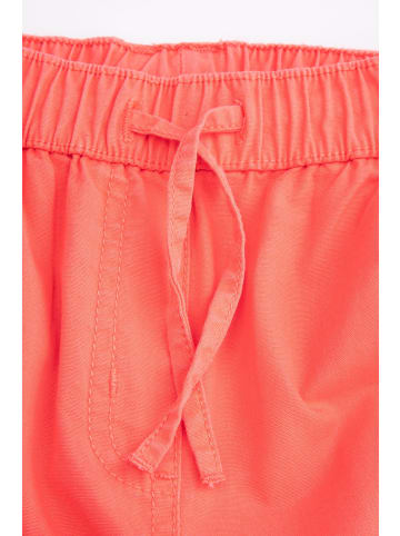 Coccodrillo Stoffhose in korallenrot