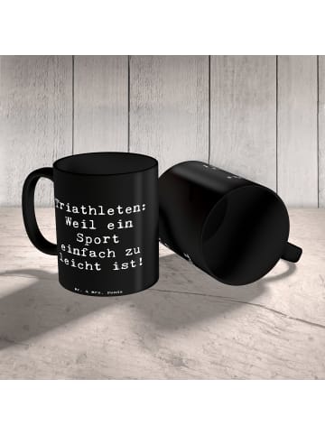 Mr. & Mrs. Panda Kaffeetasse Spruch Triathlon Helden mit Spruch in Schwarz