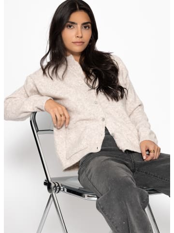 SASSYCLASSY Strickjacke mit aufgesetzten Taschen in Greige