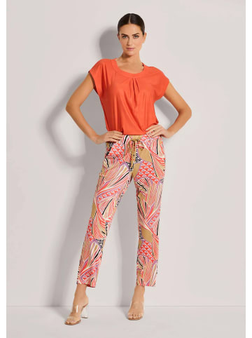 MADELEINE Farbige Schlupfhose mit grafischem Print in blutorange / multicolor