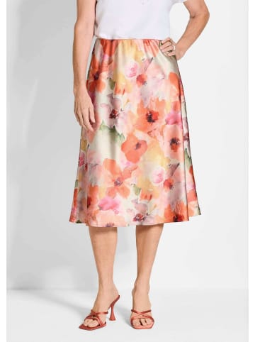 GOLDNER Glänzender Midirock in floralem Druck in pfirsich / gemustert
