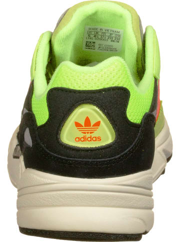 adidas Sneaker in yellow/solar red