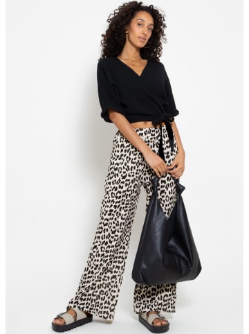 SASSYCLASSY Musselin Pants mit weitem Bein in Leo-Print in Hellbeige