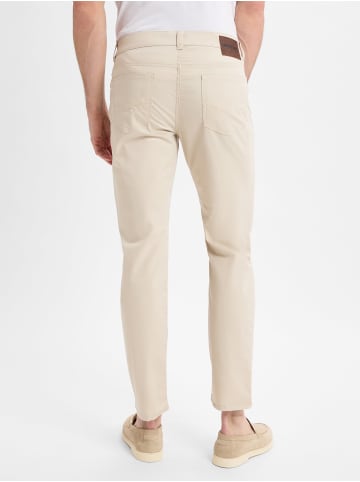 Andrew James Hose in sand