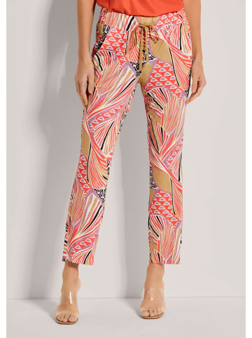MADELEINE Farbige Schlupfhose mit grafischem Print in blutorange / multicolor
