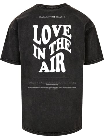 Merchcode T-Shirt "Love In The Air Acid Washed Heavy Oversize Tee" in Schwarz