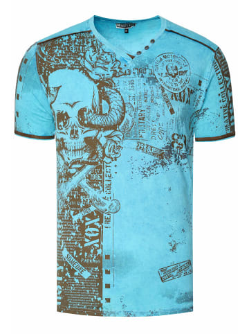 Rusty Neal V-Neck T-Shirt mit All Over Skull X Snake Print und Wildleder-Details in Türkis