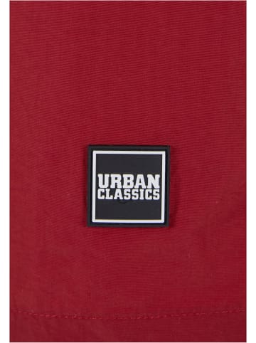 Urban Classics Badeshorts in brickred/darkshadow