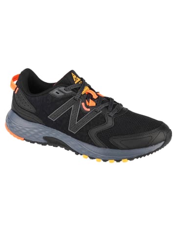 New Balance New Balance MT410 in Schwarz