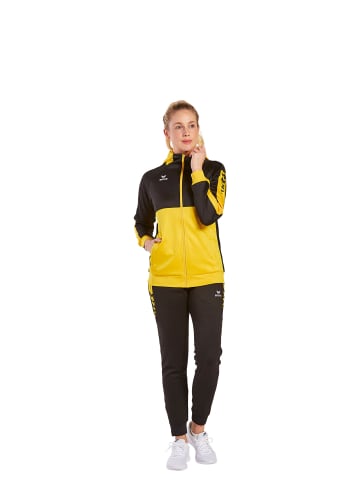 erima Damen Six Wings Trainingsjacke mit Kapuze in gelb/schwarz