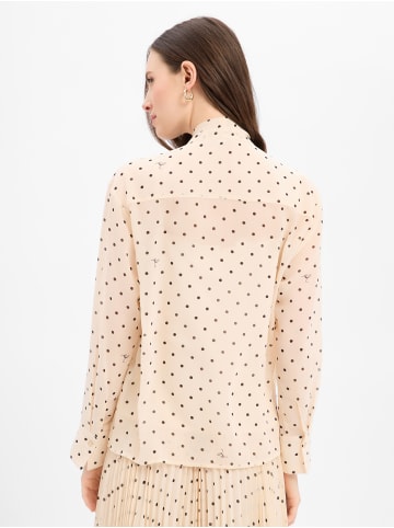 Bluse in beige schwarz