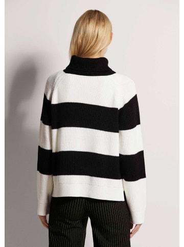 MADELEINE Rollkragen-Pullover mit Blockstreifen in schwarz / wollweiß