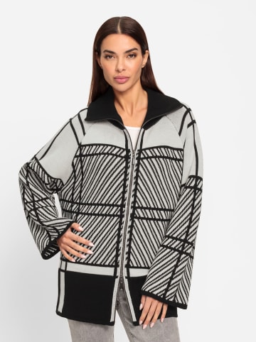 Heine Strickjacke in schwarz-ecru-gemustert