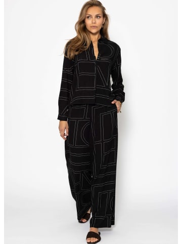 SASSYCLASSY Schlupfhose mit Print in Schwarz