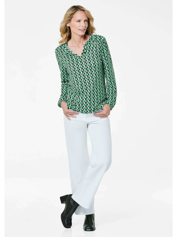 GOLDNER Kurzgröße:  Jerseybluse Elegantes Blusenshirt mit V-Ausschnitt in grün / gemustert