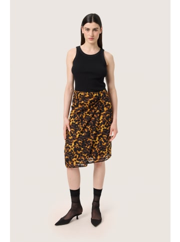 Soaked in Luxury Rock SLGunvy Feminine Form in Tortoise Print