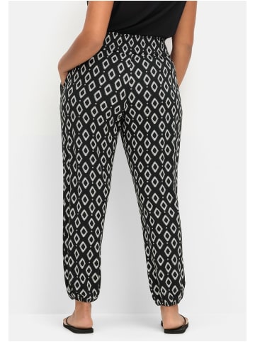 sheego Jerseyhose in schwarz gemustert