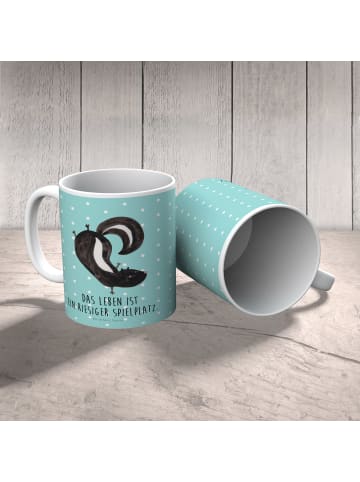 Mr. & Mrs. Panda Kindertasse Stinktier Handstand mit Spruch in Türkis Pastell