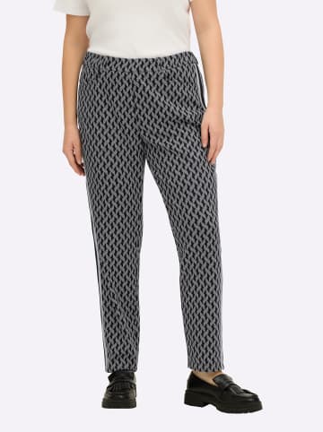 sheego Hose in schwarz-ecru-gemustert