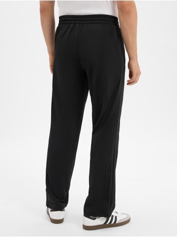 Adidas originals Hose Firebird in schwarz