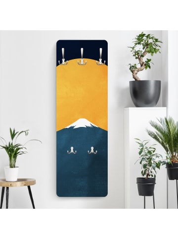 WALLART Garderobe - Sonne, Mond und Berge in Gelb