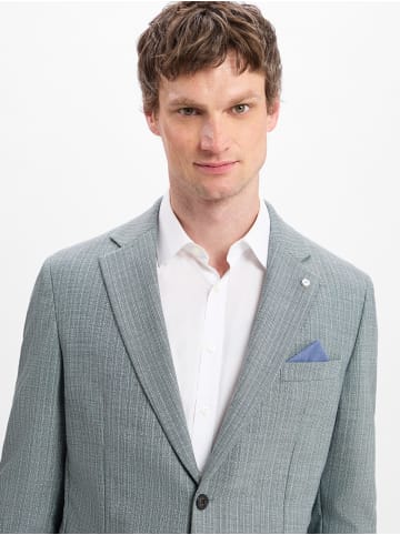 Andrew James Sakko Brayden in grau