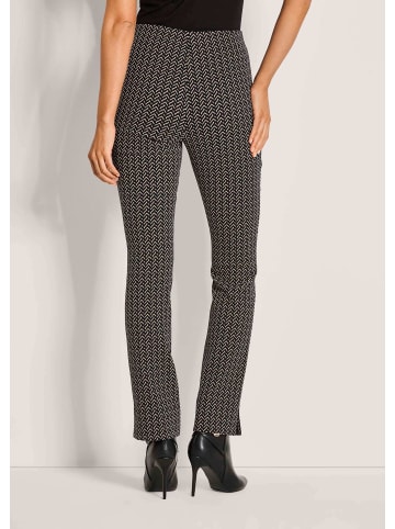 MADELEINE Bootcut-Hose mit Allover-Print in schwarz / cappuccino