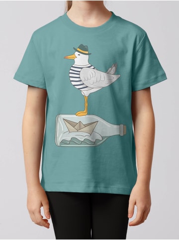 wat? Apparel T-Shirt Möwe mit Hut in Teal Monstera