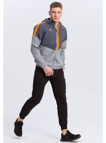 erima Squad Tracktop Trainingsjacke mit Kapuze in slate grey/monument grey/new orange